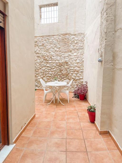 Ca Toni. Agradable Con Chimenea . Hébergement de vacances Beniarjo